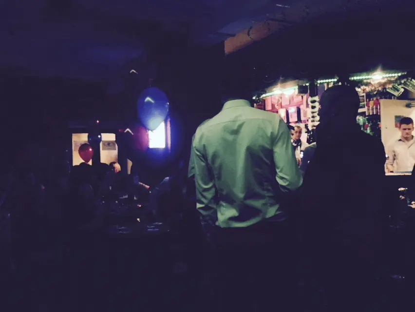 Crowd inside a busy bar